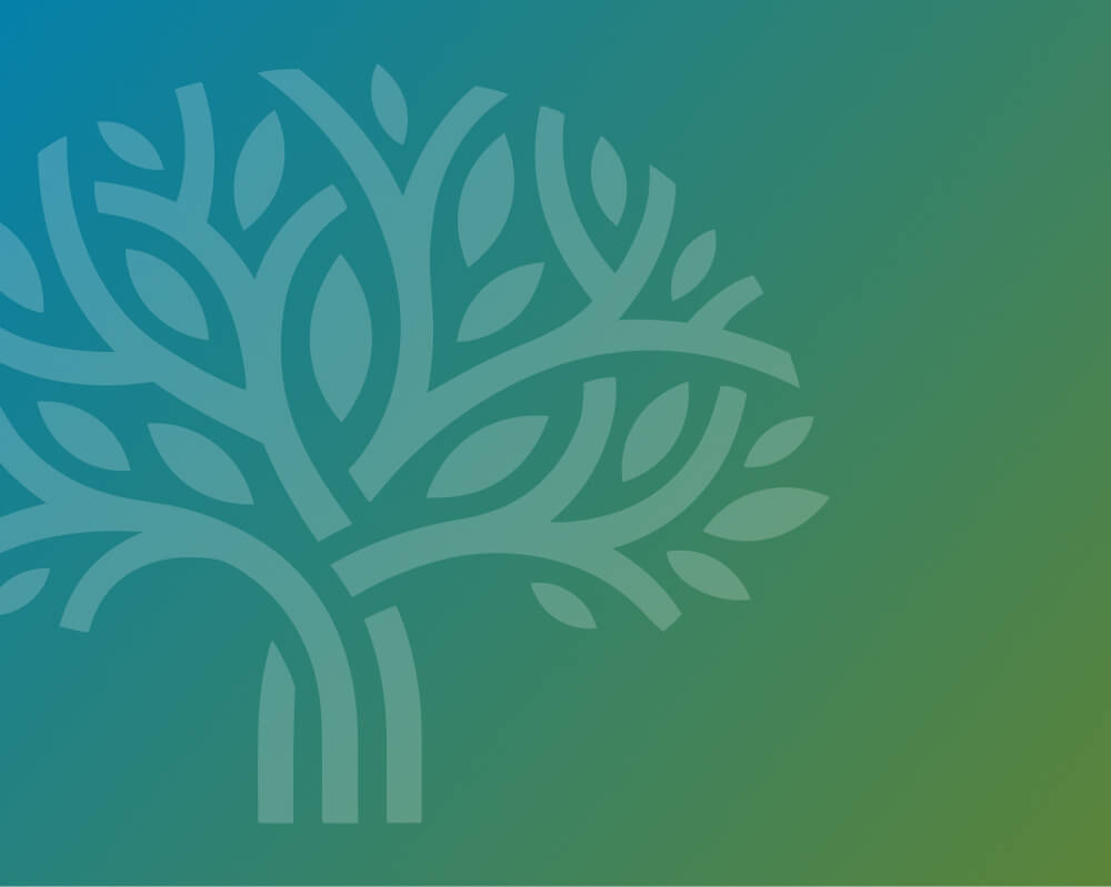 Gradient blue to green with a white tree over top