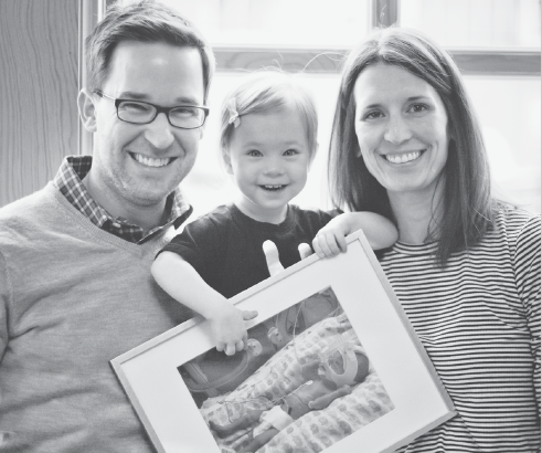 Eric and Amanda Skalland with their daughter Elin