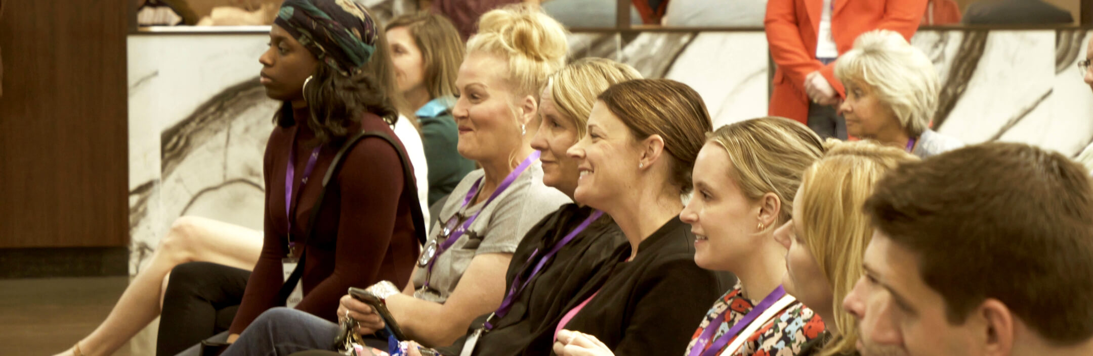 Group of women listening to someone talking