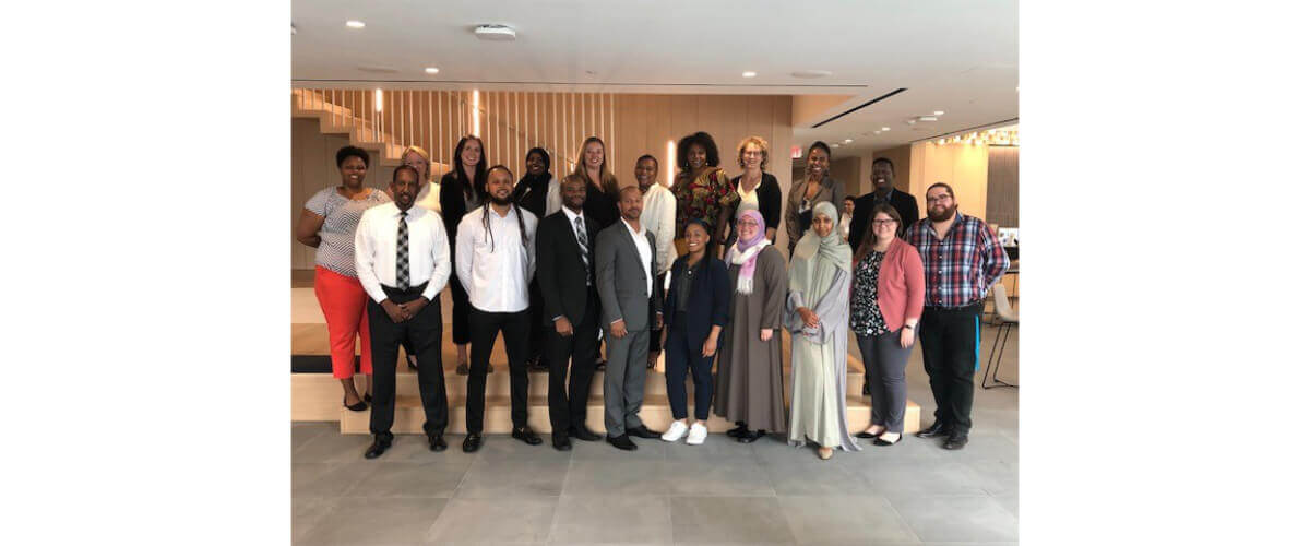 Group of people posing for professional development