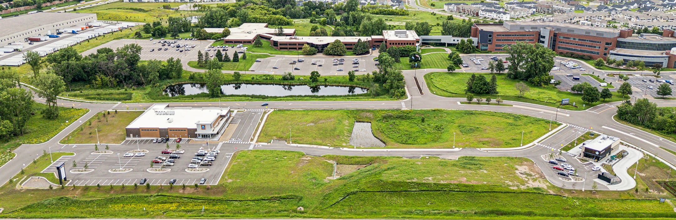 Drone image of Starbucks store and Aldi grocery store
